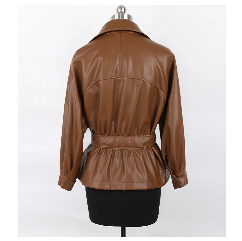 Mauroicardi 2025 Spring/Fall Collection – Women’s Short PU Leather Jacket. Crafted from soft, lightweight material with a fitted silhouette, raglan sleeves, and stylish sash detailing. Available in elegant brown and class
