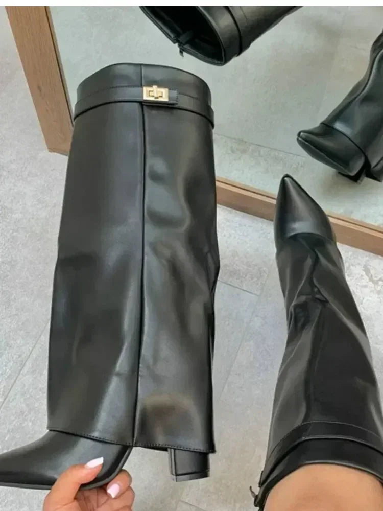 2025 Autumn/Winter Collection – Women’s Pointed-Toe Knee-High Boots with Metal Buckle. Featuring a thick high heel and sleek mid-leg design for a chic, fashionable look. Perfect for pairing with dresses or pants for elega