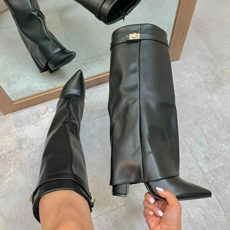 2025 Autumn/Winter Collection – Women’s Pointed-Toe Knee-High Boots with Metal Buckle. Featuring a thick high heel and sleek mid-leg design for a chic, fashionable look. Perfect for pairing with dresses or pants for elega