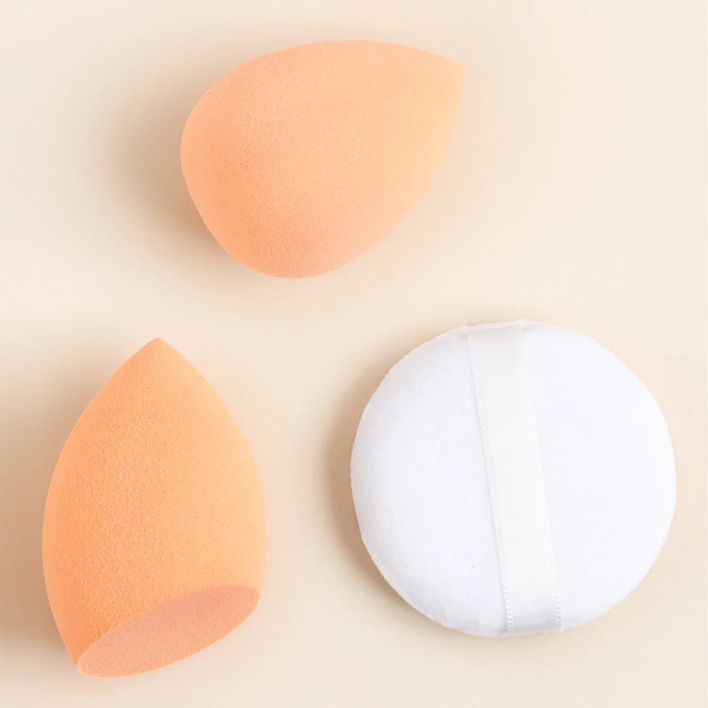 12-Piece Professional Makeup Brush Set with Sponges & Powder Puff. A complete makeup essential kit featuring high-quality brushes for eyeshadow, powder, and blush application. Includes 12 premium brushes, 2 blending sponges,