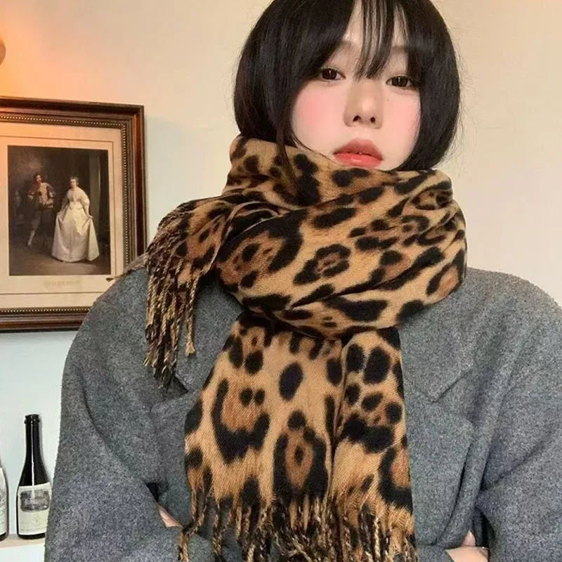 Luxury Leopard Print Tassel Scarf – Imitation Cashmere Wrap for Women. Thick, soft, and windproof design provides warmth and style during autumn and winter. Perfect as a fashionable shawl, wrap, or neck warmer for any occas