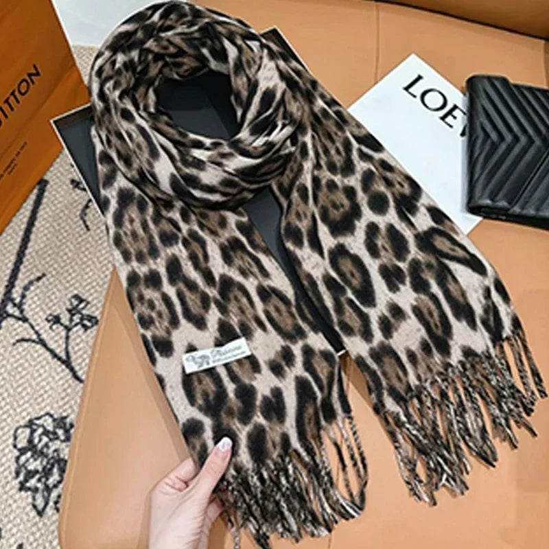 Luxury Leopard Print Tassel Scarf – Imitation Cashmere Wrap for Women. Thick, soft, and windproof design provides warmth and style during autumn and winter. Perfect as a fashionable shawl, wrap, or neck warmer for any occas
