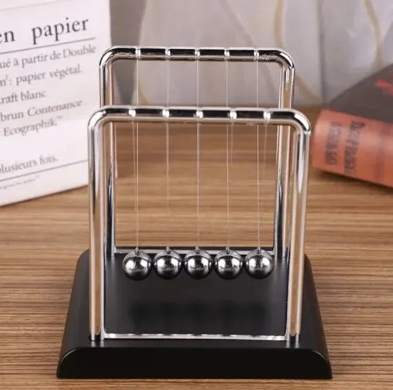 Newton’s Cradle Balance Ball – Steel Physics Pendulum Model for Desk Display. Ideal as a teaching tool, science demonstration, or stress-relief toy. A sleek and modern desktop decoration that combines education, motion, a