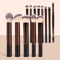 12-Piece Professional Makeup Brush Set with Sponges & Powder Puff. A complete makeup essential kit featuring high-quality brushes for eyeshadow, powder, and blush application. Includes 12 premium brushes, 2 blending sponges,