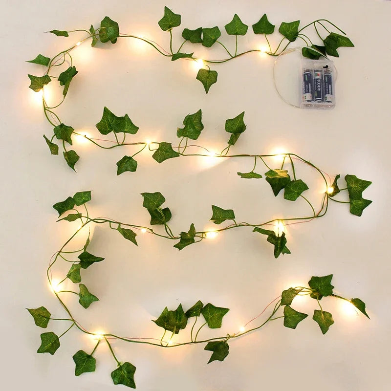 2M / 5M / 10M LED Silk Leaf Ivy Vine String Lights – Artificial Greenery Garland for Home, Wedding, and Event Decoration. Features realistic silk leaves and warm LED lighting, perfect for creating elegant, nature-inspired d