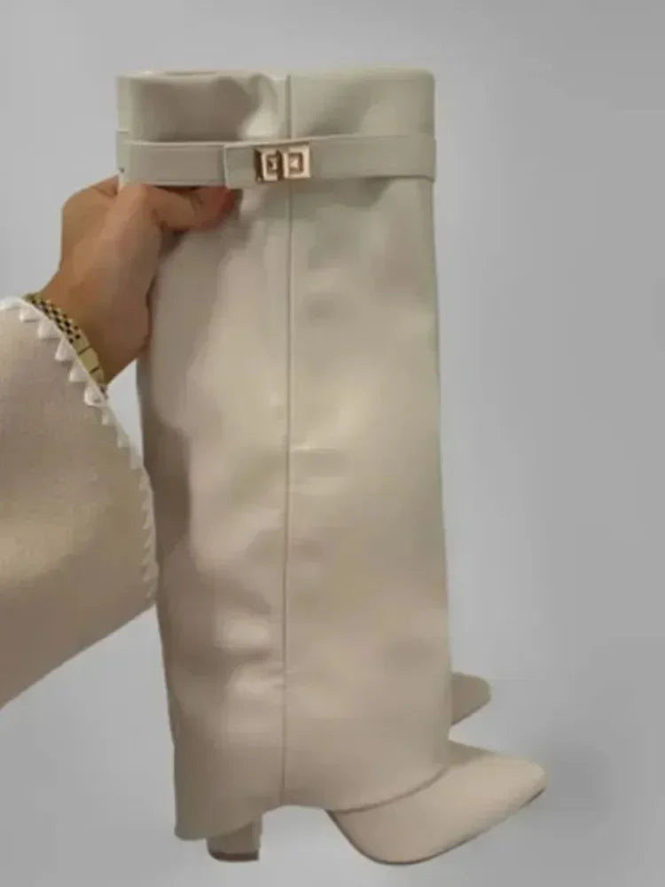 2025 Autumn/Winter Collection – Women’s Pointed-Toe Knee-High Boots with Metal Buckle. Featuring a thick high heel and sleek mid-leg design for a chic, fashionable look. Perfect for pairing with dresses or pants for elega