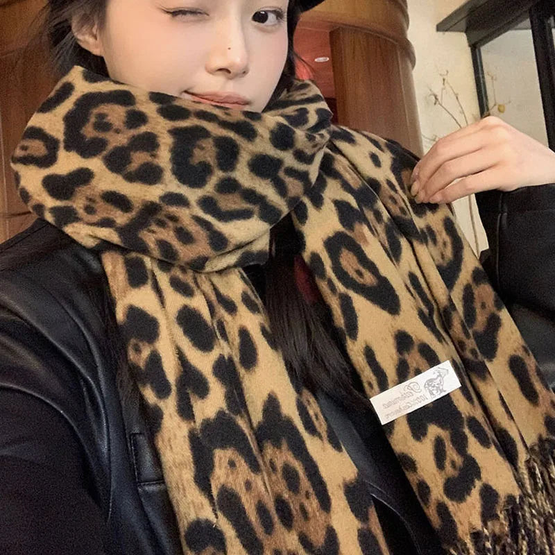 Luxury Leopard Print Tassel Scarf – Imitation Cashmere Wrap for Women. Thick, soft, and windproof design provides warmth and style during autumn and winter. Perfect as a fashionable shawl, wrap, or neck warmer for any occas