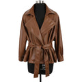 Mauroicardi 2025 Spring/Fall Collection – Women’s Short PU Leather Jacket. Crafted from soft, lightweight material with a fitted silhouette, raglan sleeves, and stylish sash detailing. Available in elegant brown and class