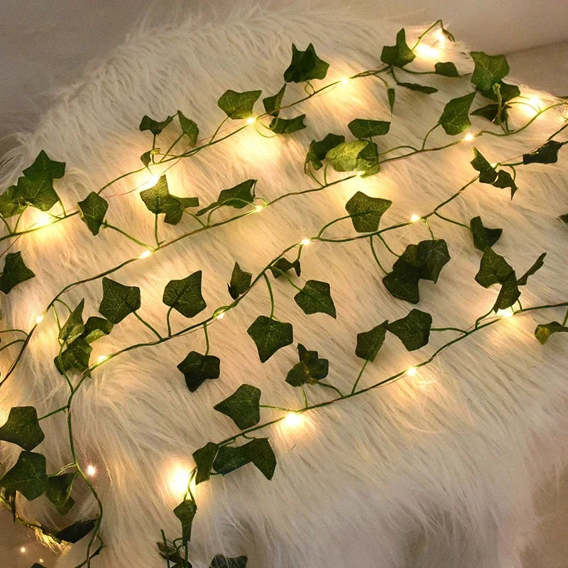 2M / 5M / 10M LED Silk Leaf Ivy Vine String Lights – Artificial Greenery Garland for Home, Wedding, and Event Decoration. Features realistic silk leaves and warm LED lighting, perfect for creating elegant, nature-inspired d