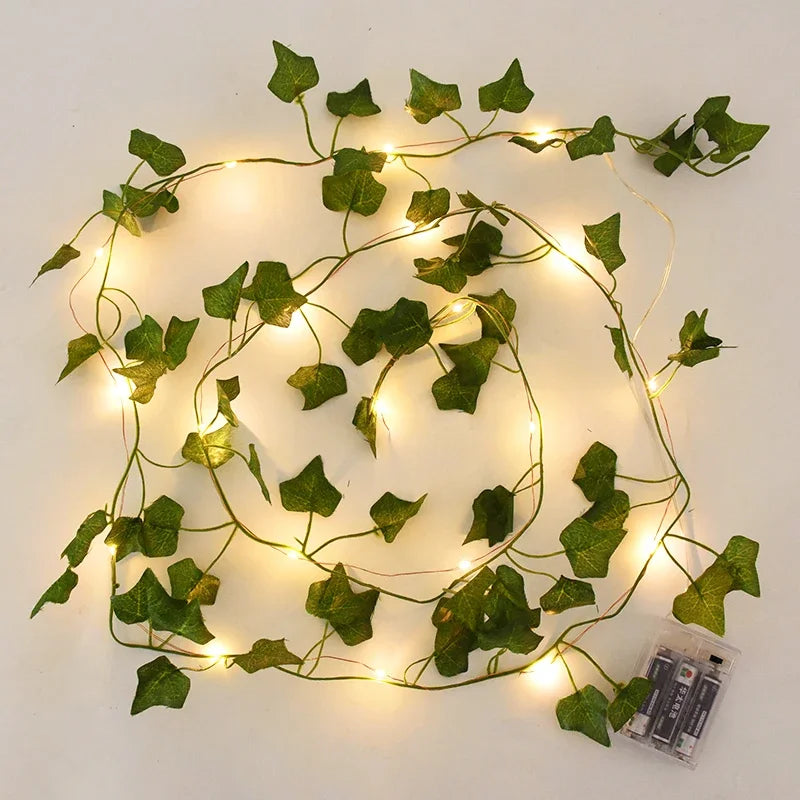 2M / 5M / 10M LED Silk Leaf Ivy Vine String Lights – Artificial Greenery Garland for Home, Wedding, and Event Decoration. Features realistic silk leaves and warm LED lighting, perfect for creating elegant, nature-inspired d
