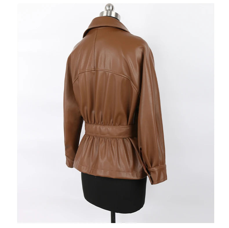 Mauroicardi 2025 Spring/Fall Collection – Women’s Short PU Leather Jacket. Crafted from soft, lightweight material with a fitted silhouette, raglan sleeves, and stylish sash detailing. Available in elegant brown and class