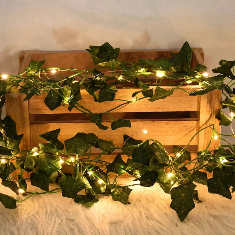 2M / 5M / 10M LED Silk Leaf Ivy Vine String Lights – Artificial Greenery Garland for Home, Wedding, and Event Decoration. Features realistic silk leaves and warm LED lighting, perfect for creating elegant, nature-inspired d