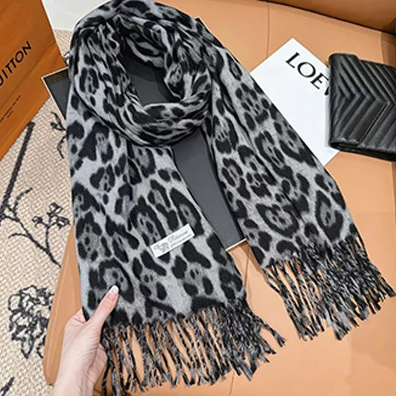 Luxury Leopard Print Tassel Scarf – Imitation Cashmere Wrap for Women. Thick, soft, and windproof design provides warmth and style during autumn and winter. Perfect as a fashionable shawl, wrap, or neck warmer for any occas