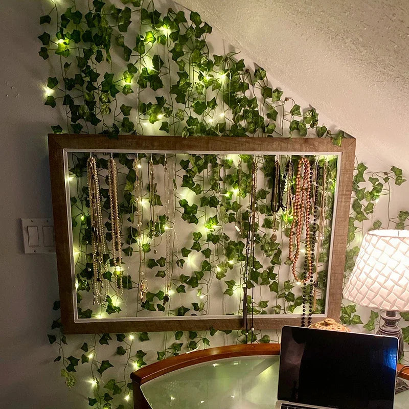 2M / 5M / 10M LED Silk Leaf Ivy Vine String Lights – Artificial Greenery Garland for Home, Wedding, and Event Decoration. Features realistic silk leaves and warm LED lighting, perfect for creating elegant, nature-inspired d