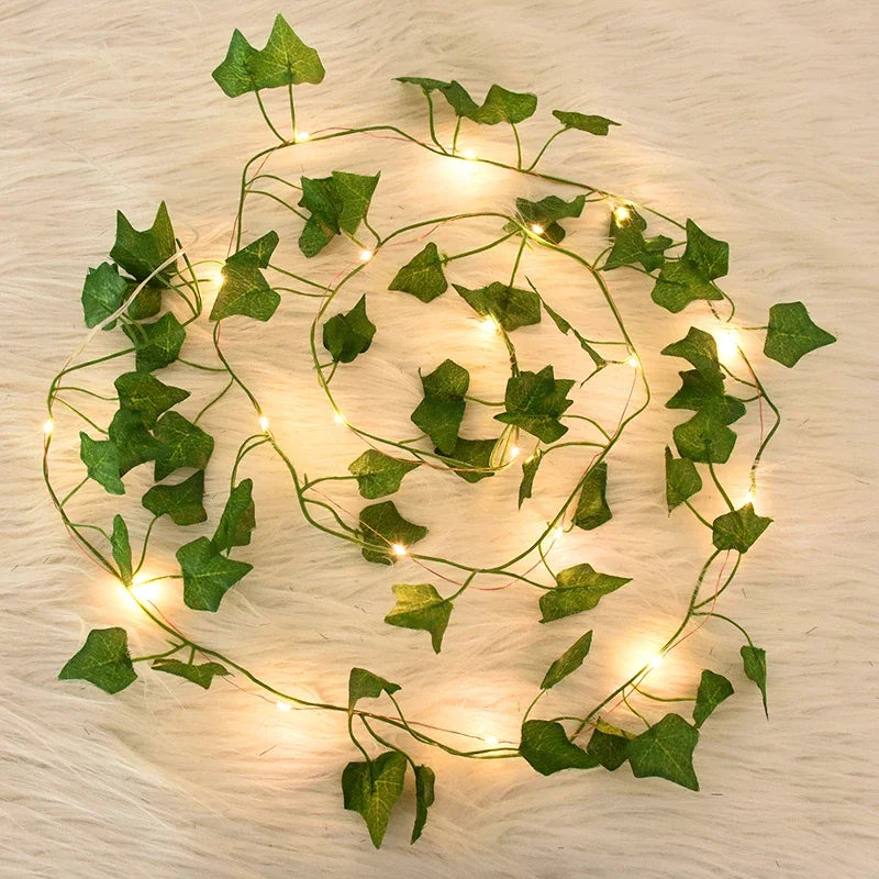2M / 5M / 10M LED Silk Leaf Ivy Vine String Lights – Artificial Greenery Garland for Home, Wedding, and Event Decoration. Features realistic silk leaves and warm LED lighting, perfect for creating elegant, nature-inspired d
