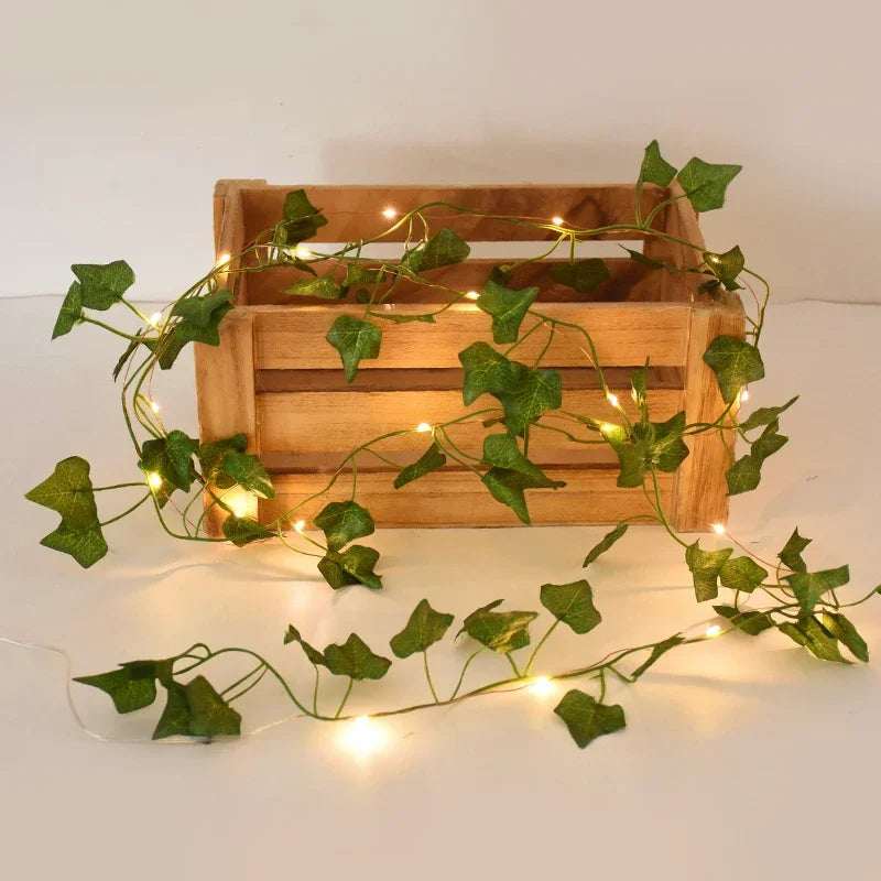 2M / 5M / 10M LED Silk Leaf Ivy Vine String Lights – Artificial Greenery Garland for Home, Wedding, and Event Decoration. Features realistic silk leaves and warm LED lighting, perfect for creating elegant, nature-inspired d