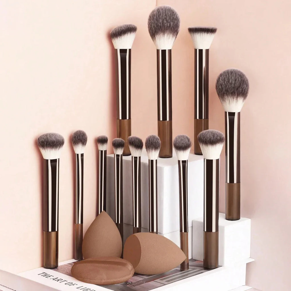 12-Piece Professional Makeup Brush Set with Sponges & Powder Puff. A complete makeup essential kit featuring high-quality brushes for eyeshadow, powder, and blush application. Includes 12 premium brushes, 2 blending sponges,