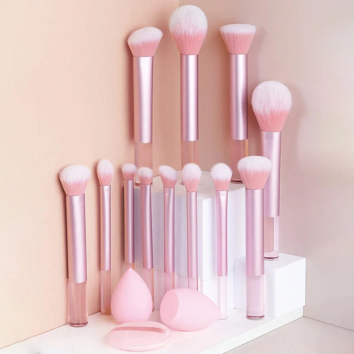 12-Piece Professional Makeup Brush Set with Sponges & Powder Puff. A complete makeup essential kit featuring high-quality brushes for eyeshadow, powder, and blush application. Includes 12 premium brushes, 2 blending sponges,