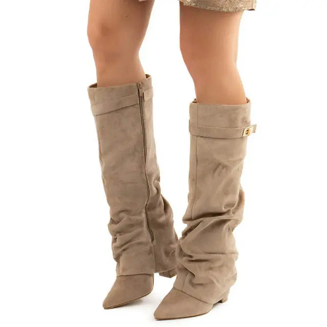 2025 Autumn/Winter Collection – Women’s Pointed-Toe Knee-High Boots with Metal Buckle. Featuring a thick high heel and sleek mid-leg design for a chic, fashionable look. Perfect for pairing with dresses or pants for elega