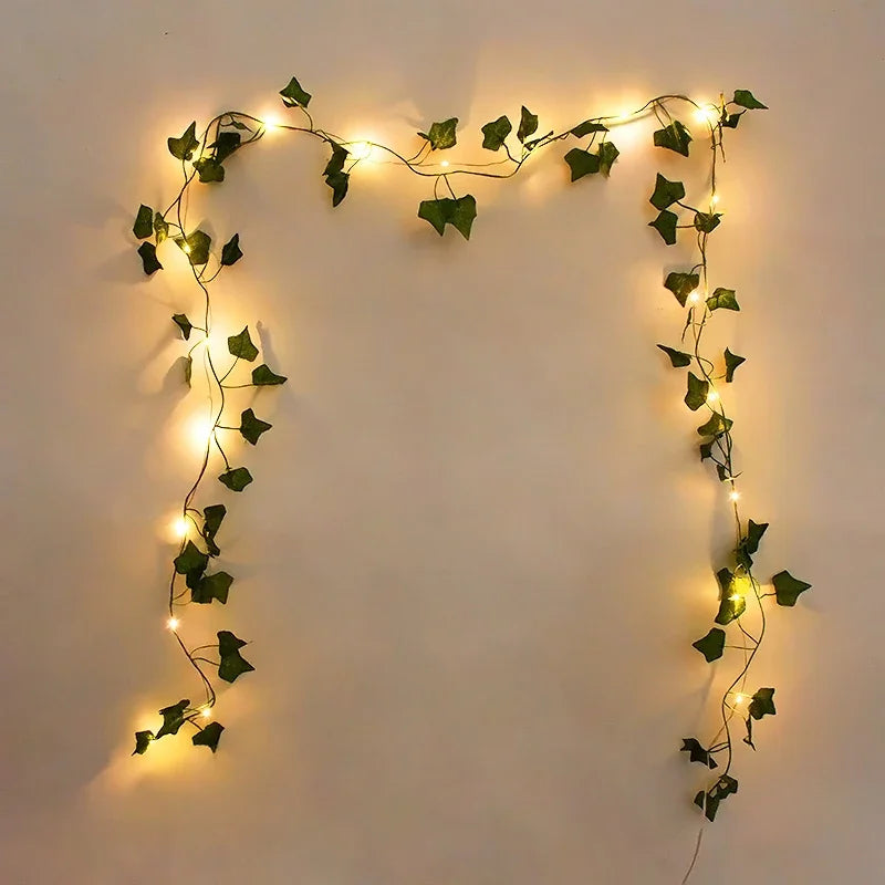 2M / 5M / 10M LED Silk Leaf Ivy Vine String Lights – Artificial Greenery Garland for Home, Wedding, and Event Decoration. Features realistic silk leaves and warm LED lighting, perfect for creating elegant, nature-inspired d