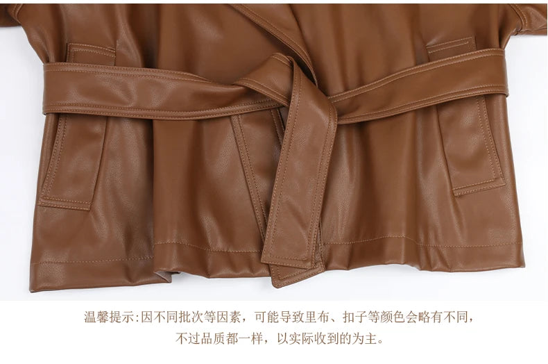 Mauroicardi 2025 Spring/Fall Collection – Women’s Short PU Leather Jacket. Crafted from soft, lightweight material with a fitted silhouette, raglan sleeves, and stylish sash detailing. Available in elegant brown and class