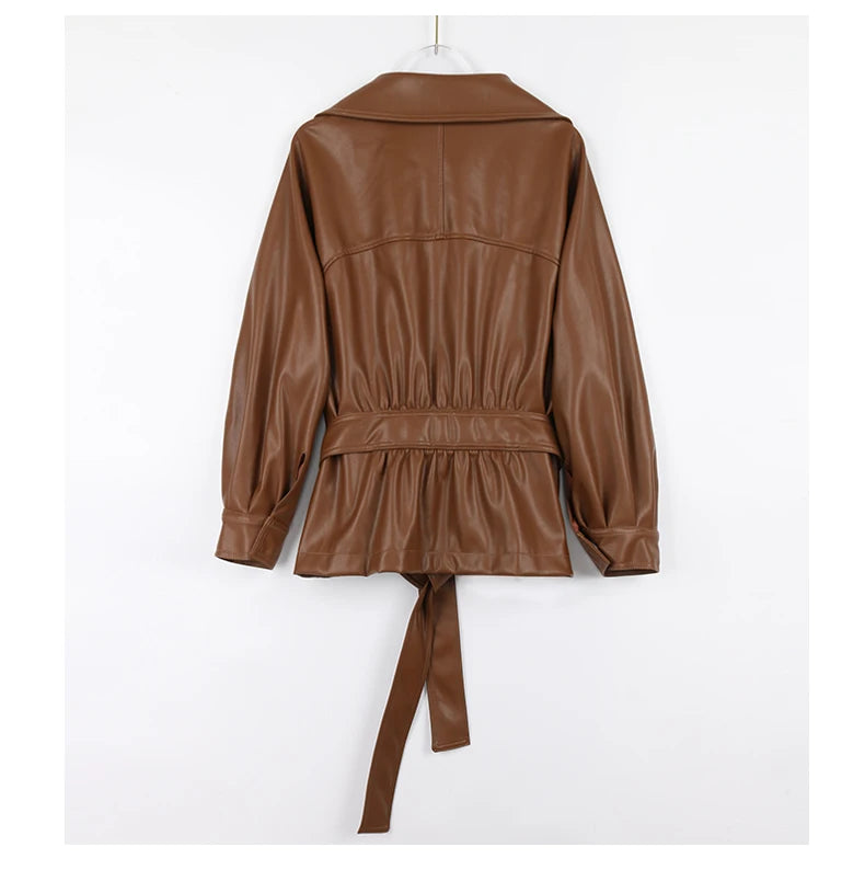 Mauroicardi 2025 Spring/Fall Collection – Women’s Short PU Leather Jacket. Crafted from soft, lightweight material with a fitted silhouette, raglan sleeves, and stylish sash detailing. Available in elegant brown and class