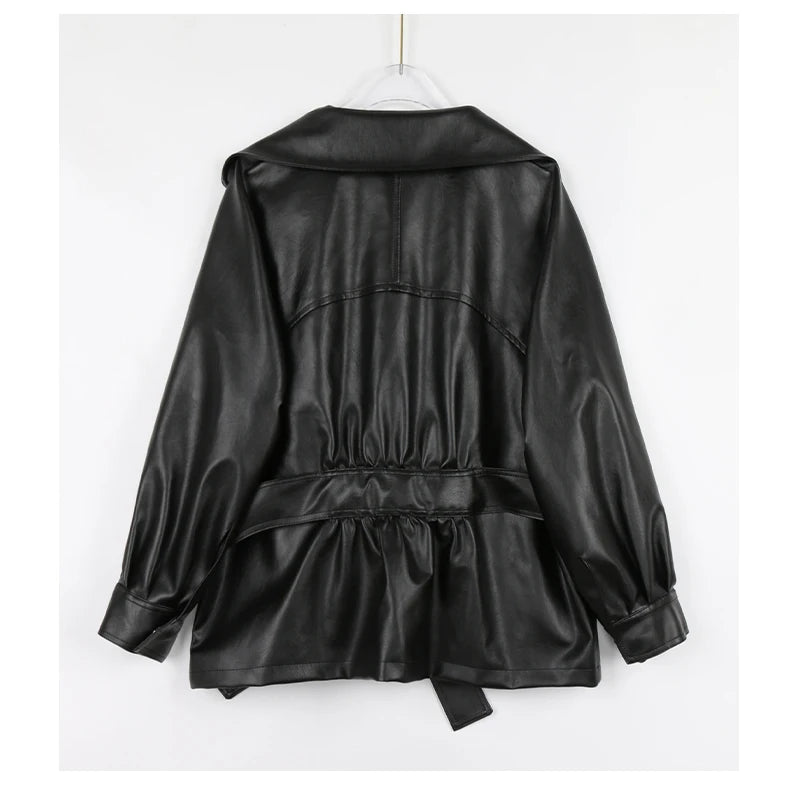 Mauroicardi 2025 Spring/Fall Collection – Women’s Short PU Leather Jacket. Crafted from soft, lightweight material with a fitted silhouette, raglan sleeves, and stylish sash detailing. Available in elegant brown and class