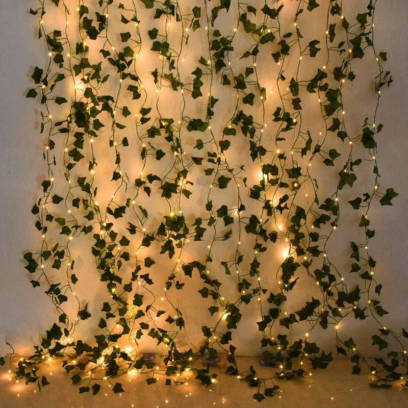 2M / 5M / 10M LED Silk Leaf Ivy Vine String Lights – Artificial Greenery Garland for Home, Wedding, and Event Decoration. Features realistic silk leaves and warm LED lighting, perfect for creating elegant, nature-inspired d