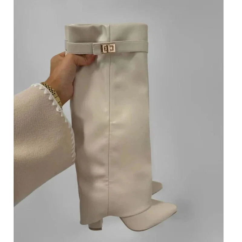 2025 Autumn/Winter Collection – Women’s Pointed-Toe Knee-High Boots with Metal Buckle. Featuring a thick high heel and sleek mid-leg design for a chic, fashionable look. Perfect for pairing with dresses or pants for elega